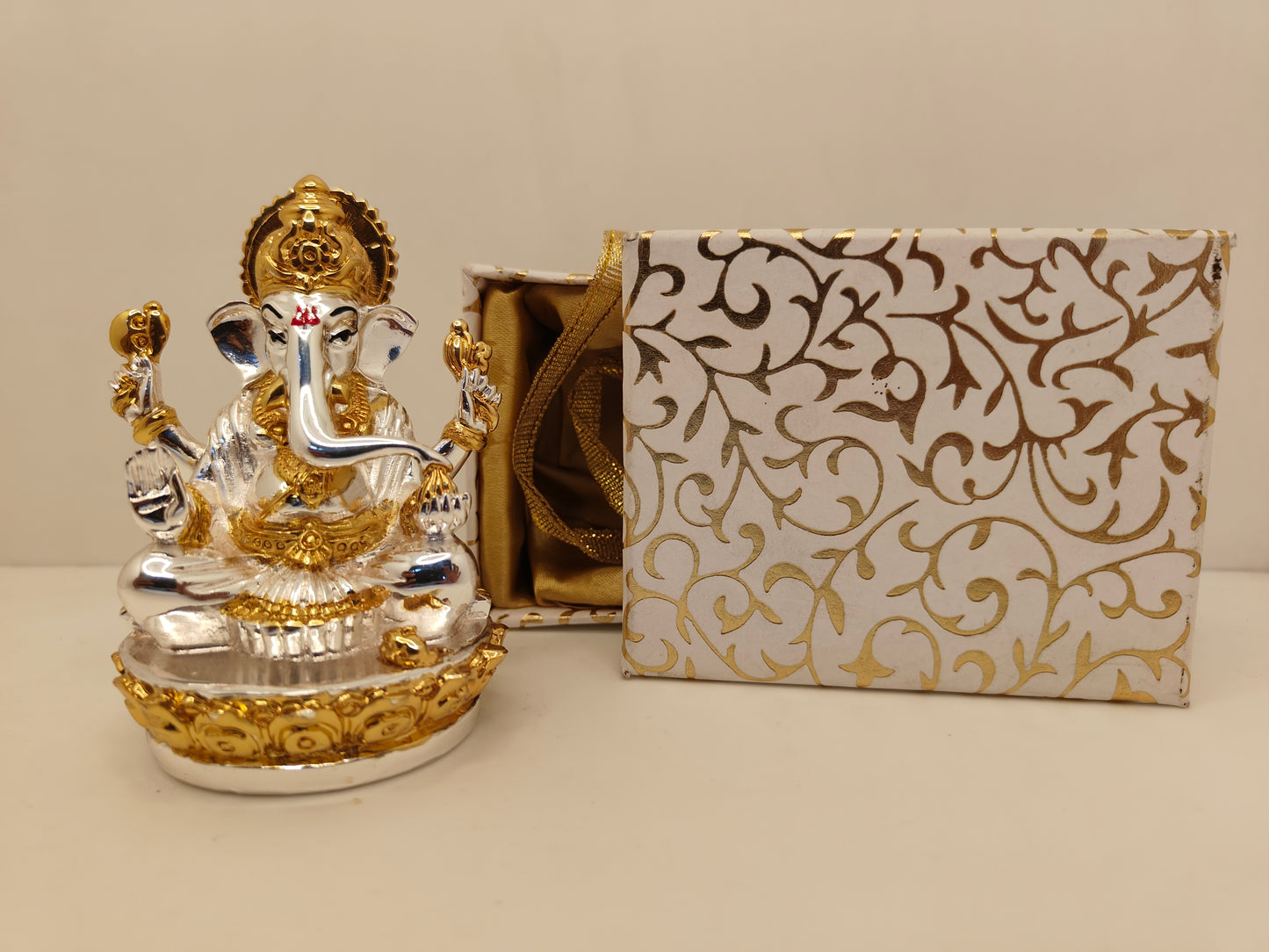 Gold and Silver Plated Lord Ganesha: Divine Beauty in Gold and Silver